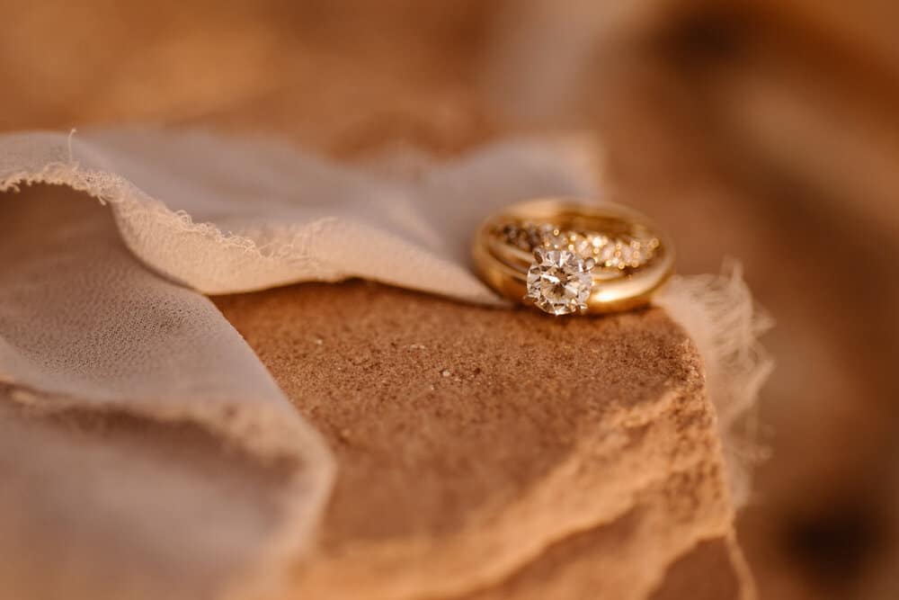 A ring detail photograph on sandstone