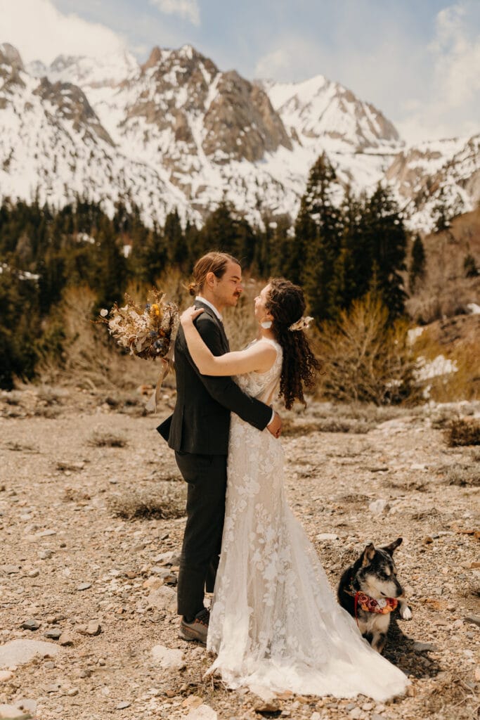A portrait of the couple in the mountains.