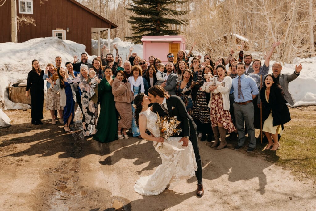A group photo at the reception with all the couple's guests.