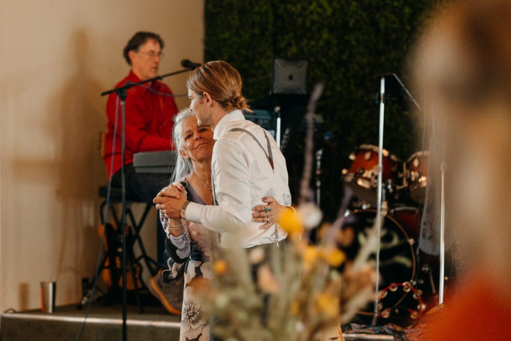 The groom and his mother share a first dance.