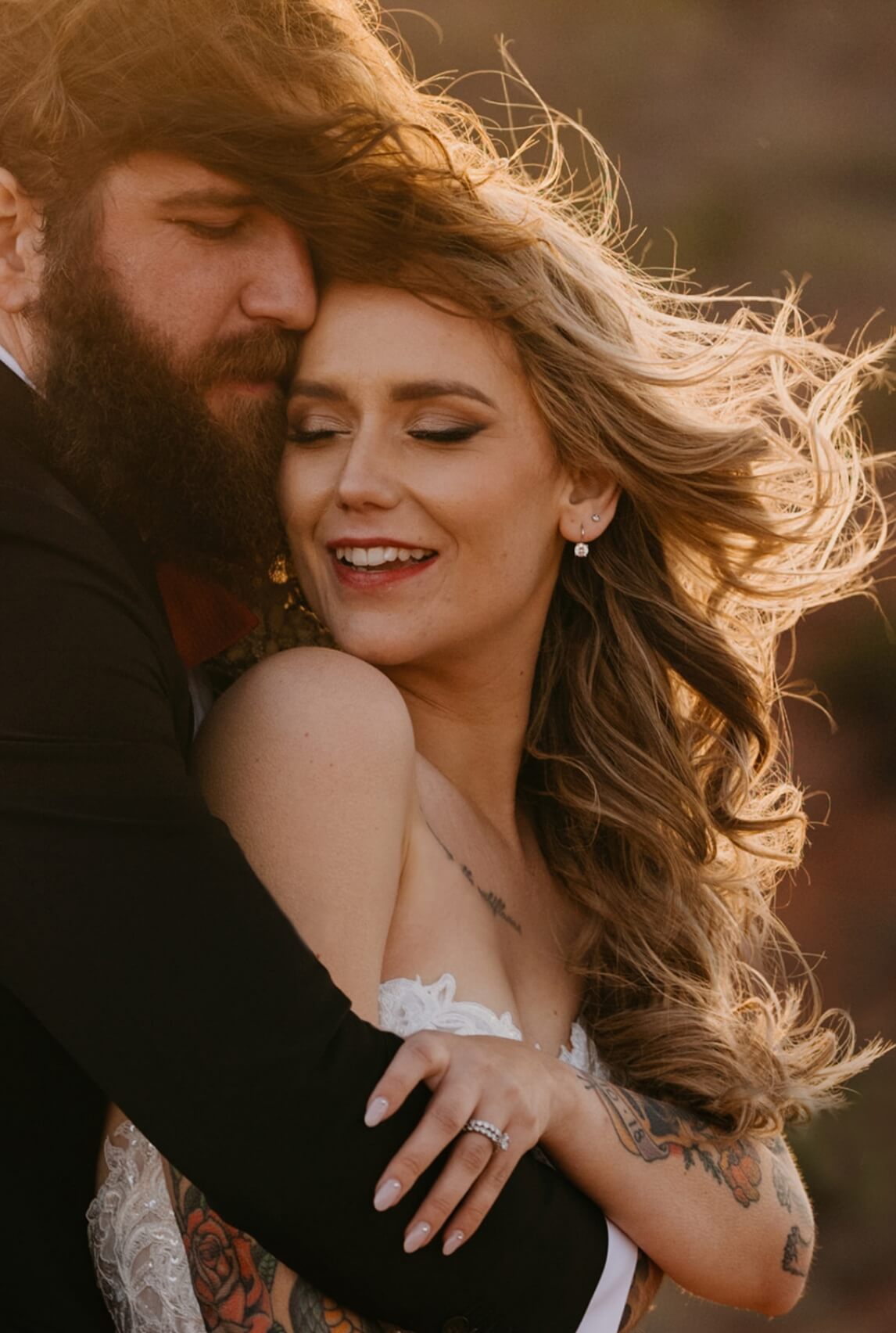 A person hugging their partner from behind as they lean into each other