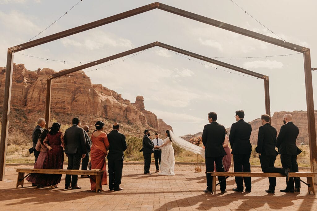 The couple holds their wedding ceremony at red earth venue.