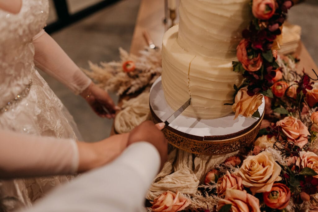 The couple cut their cake together.