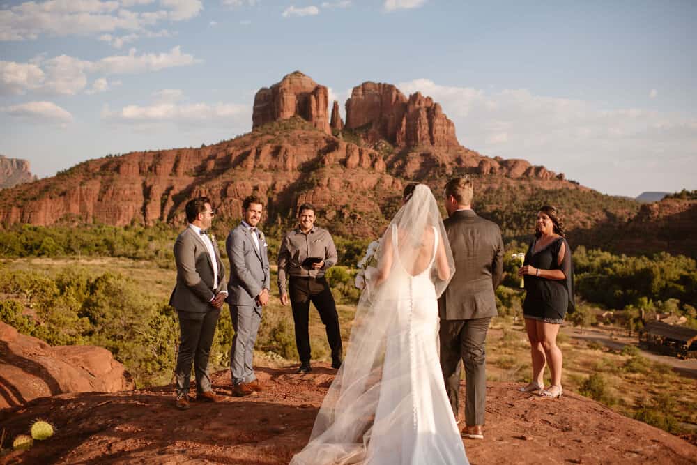 A couple walks together to their ceremony location.