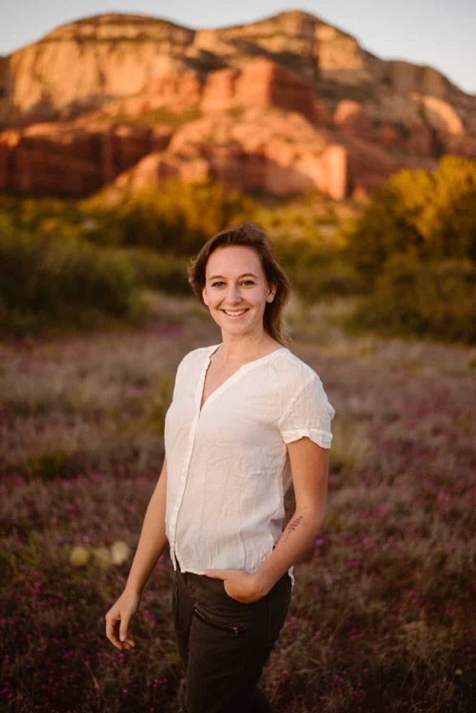 Slide Rock State Park wedding photographer stands for a portrait. 