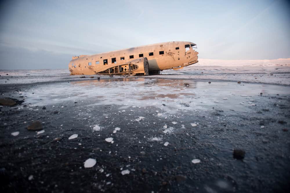 The crashed plane on the coast of Iceland on a Winter day.