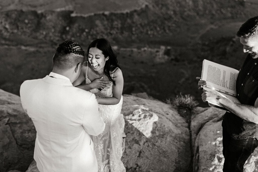 The bride laughs during the ceremony