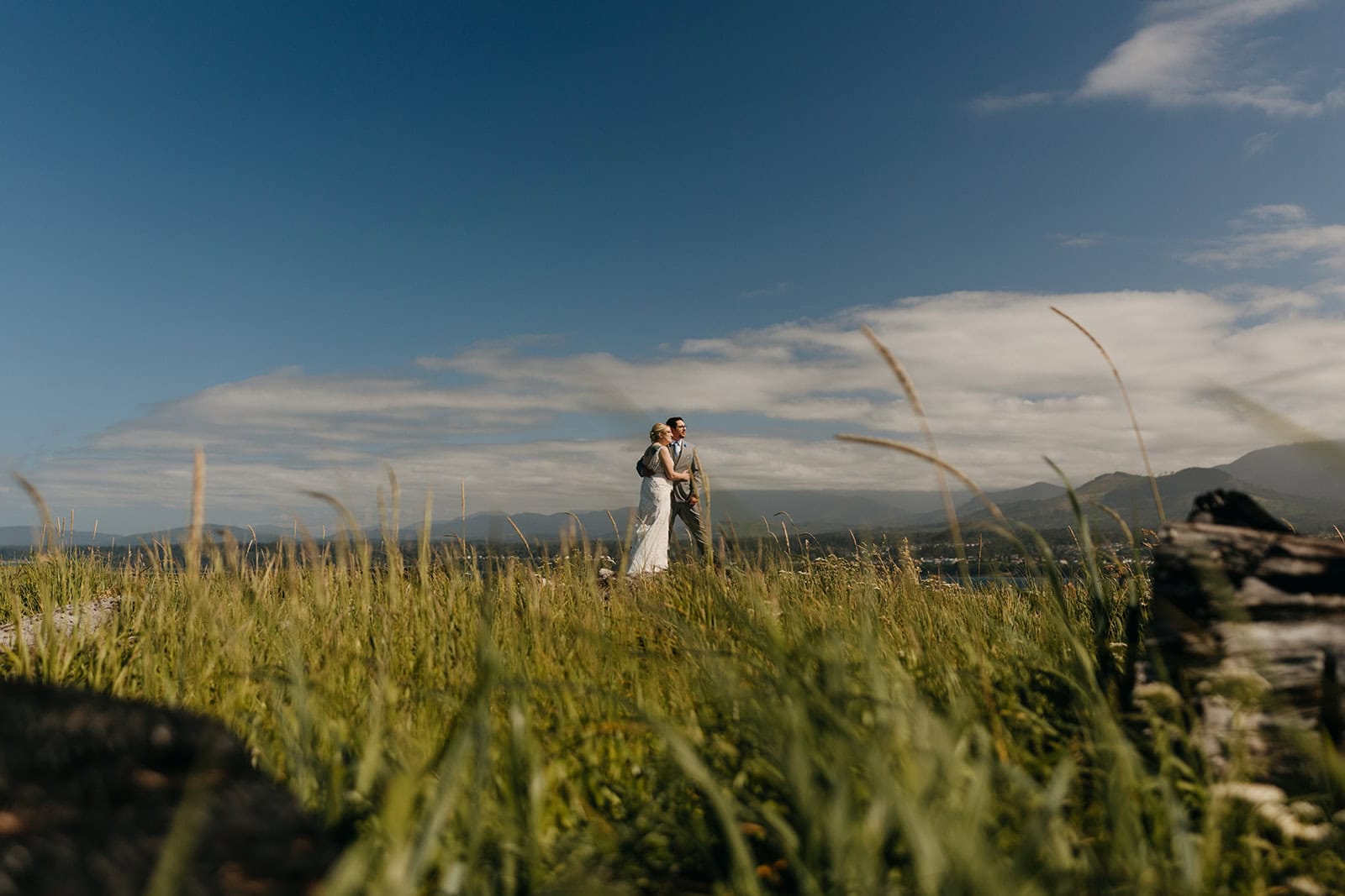A couple enjoys a sunny spring day on the coast near Port Angeles.