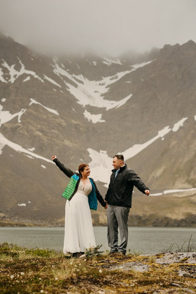 The bride and groom celebrate becoming married.