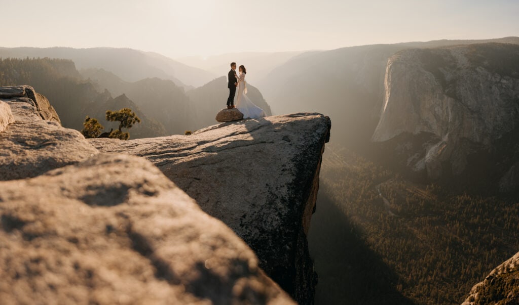A bride and groom share their private vows at Taft Point.