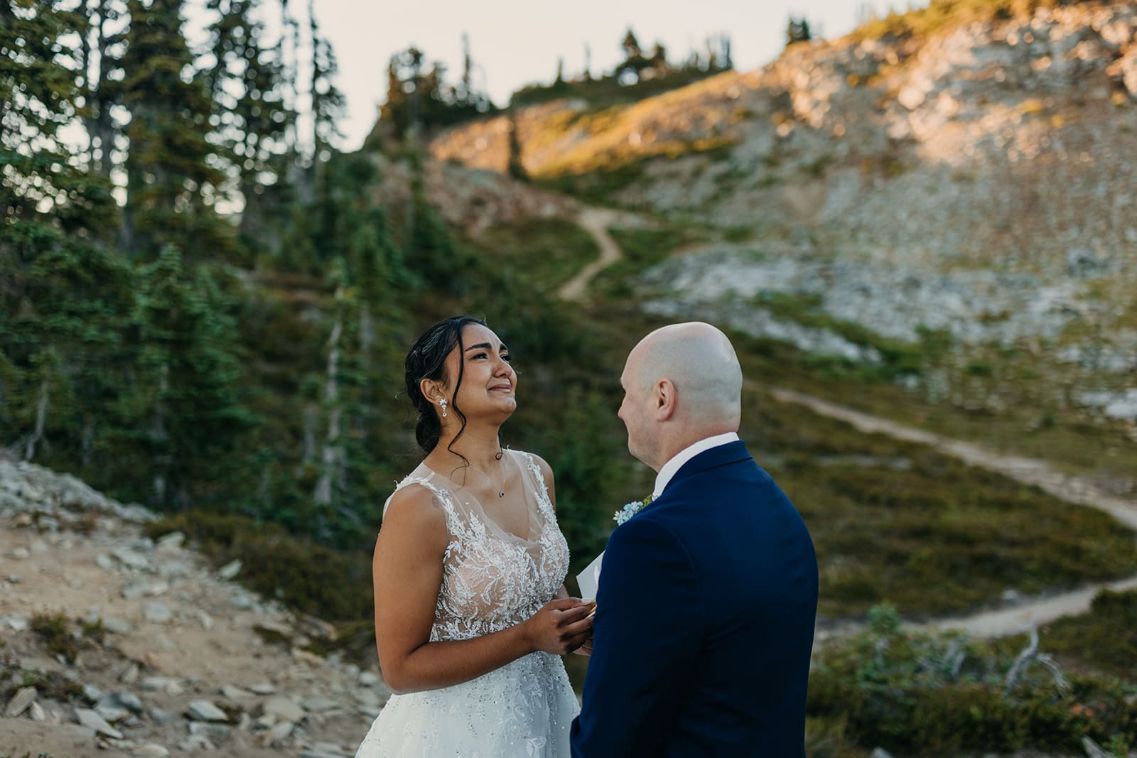 A bride becomes emotional during the elopement ceremony.