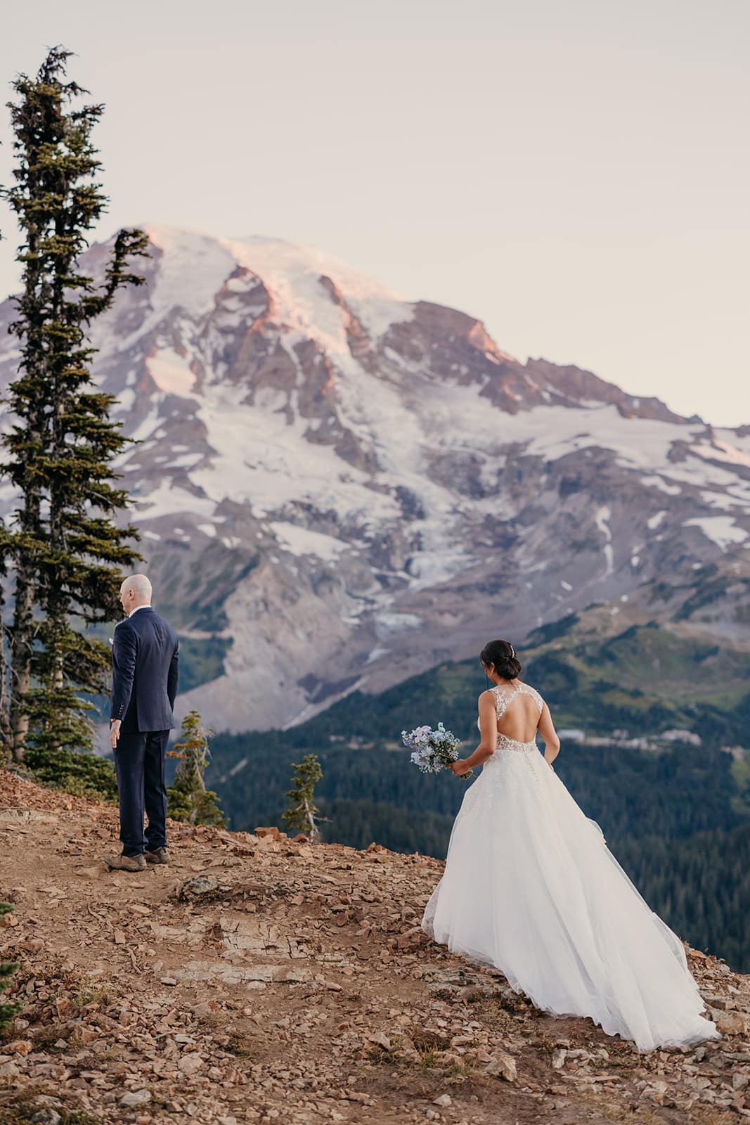 A bride walks up to her groom for a first look.
