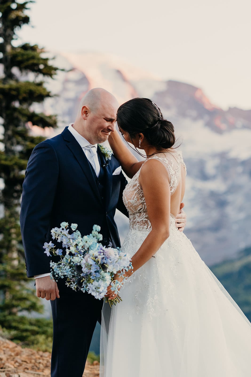 A groom becomes emotional during the first look.