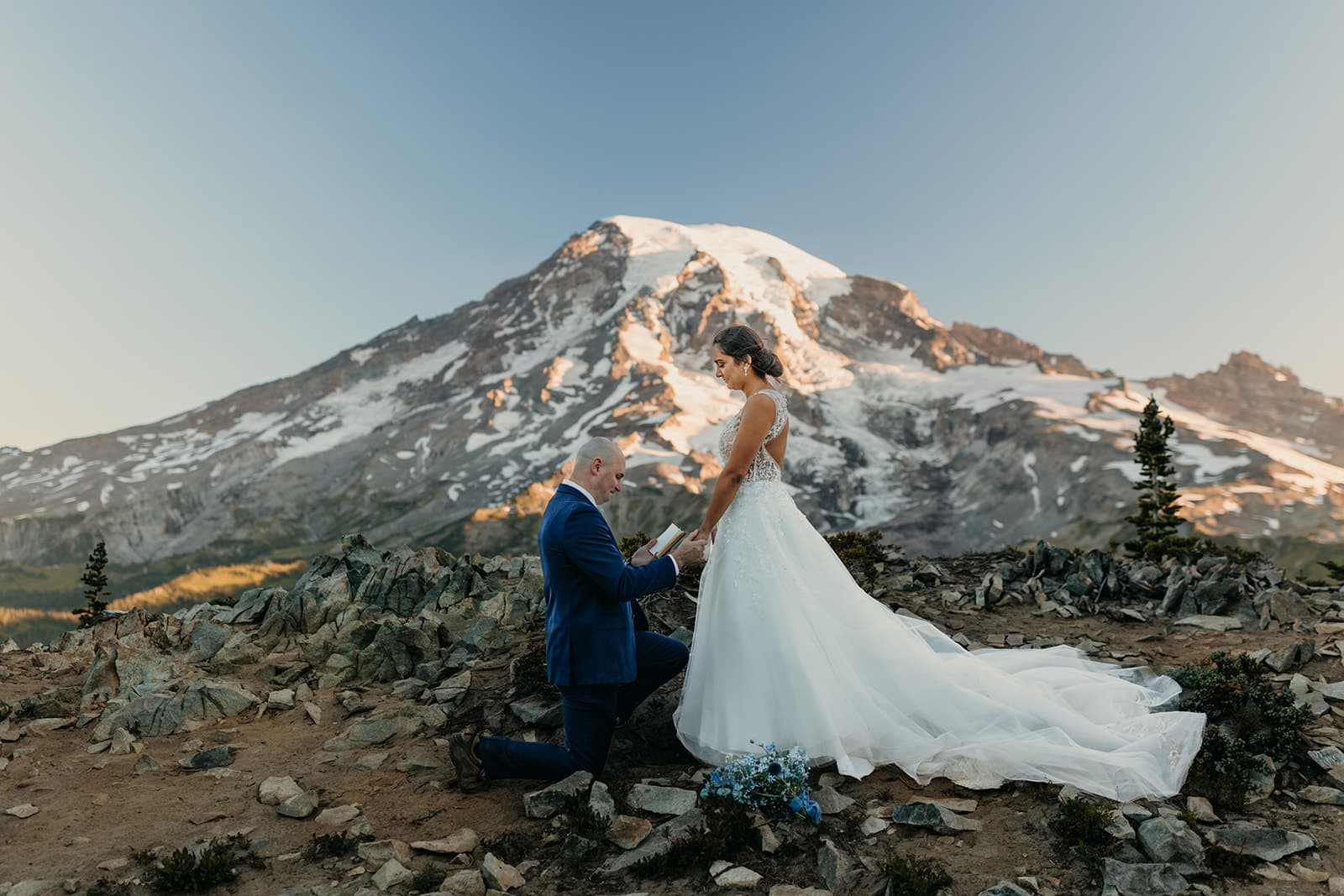 A groom proposes during his wedding ceremony.