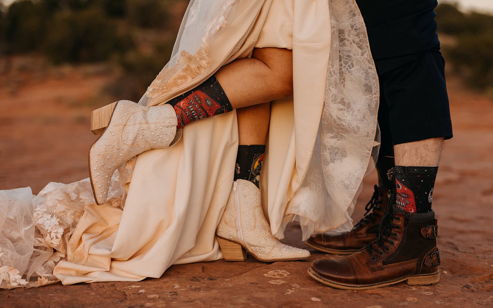 A detail photo of a bride and grooms shoes during their desert elopement.
