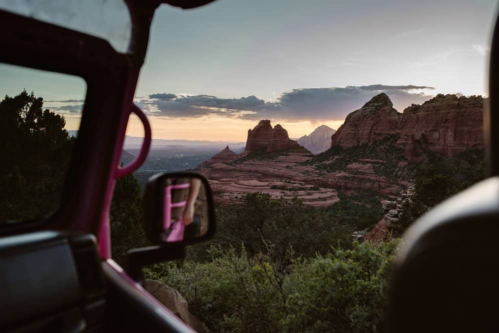 View of the red rocks as we drive down the road in the jeep.