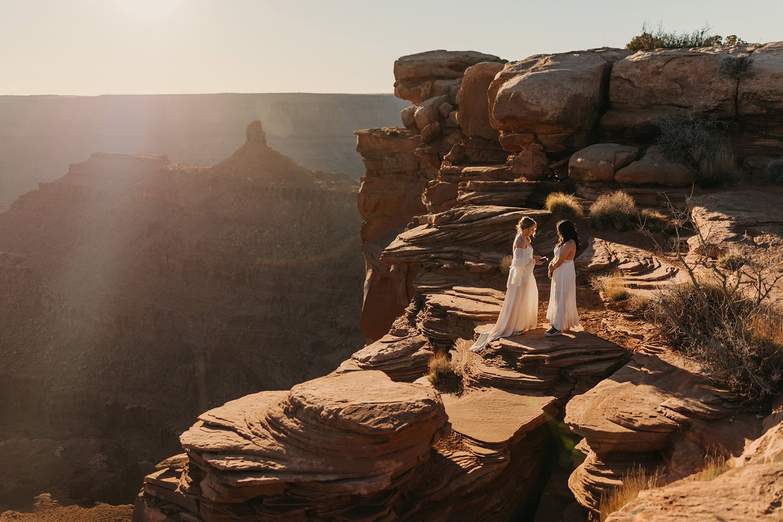 Two brides share their vows privately together at Dead Horse Point State Park.