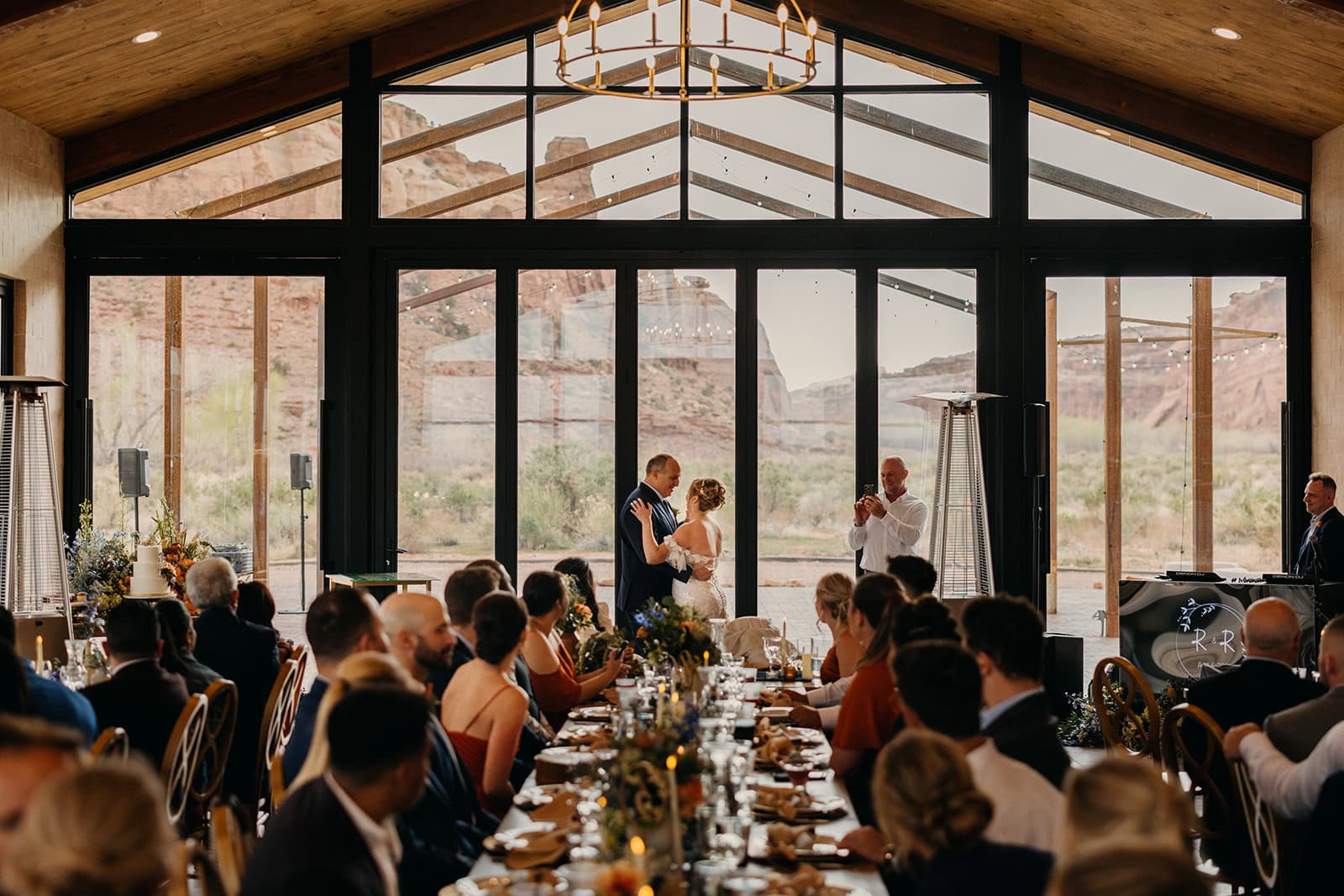 A bride dances with her father in the Red Earth Venue in Moab, Utah