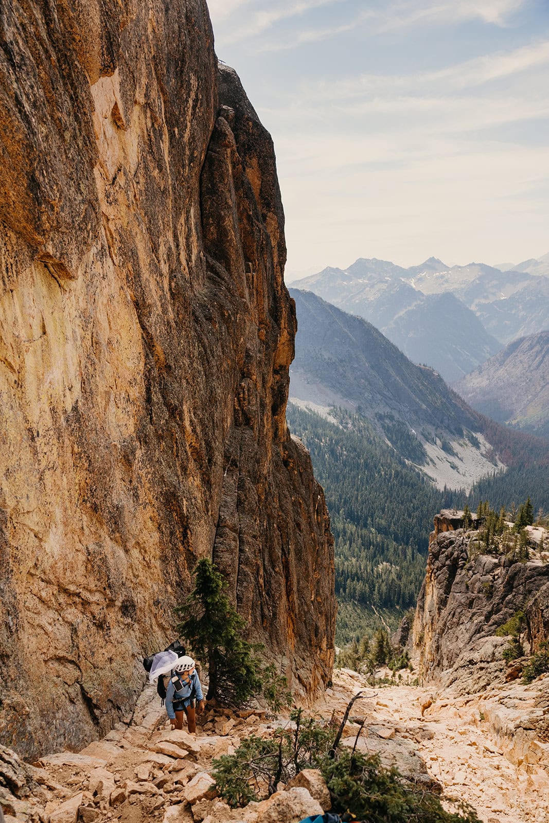 Someone hiking up the gulley on the approach to The Beckey Route of Liberty Bell Mountain in Washington