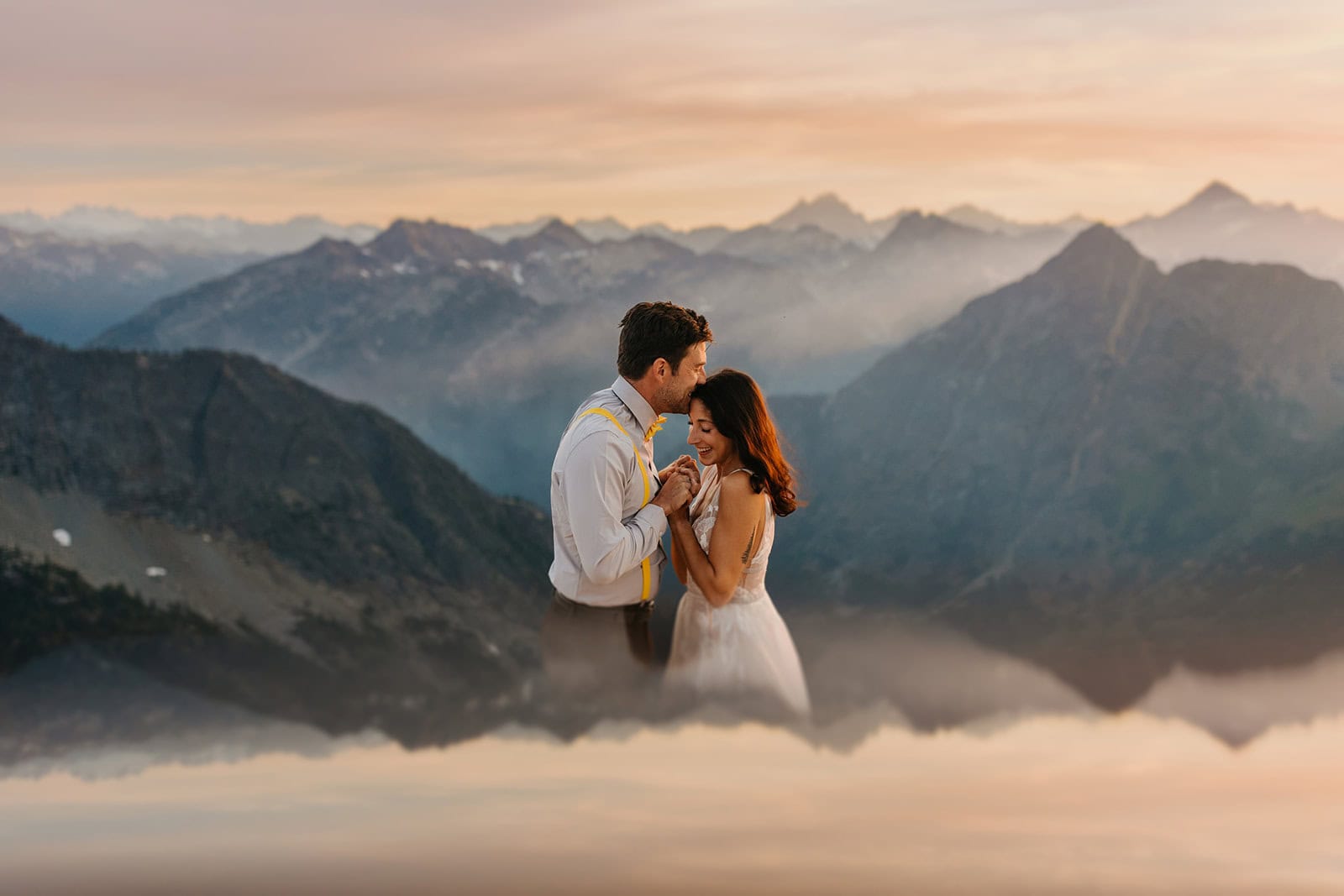 A reflection image of a couple sharing a kiss